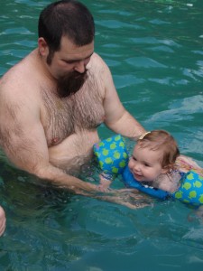 Rory, six months old and happy in the water.