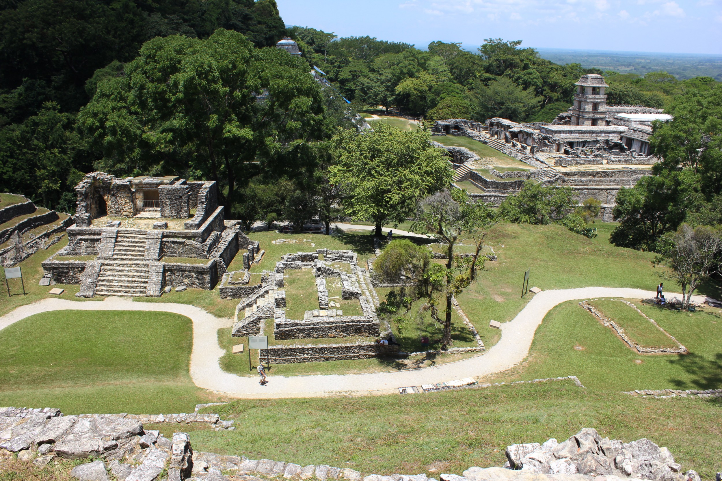 An overview of the ruins from the top of the Temple of the Sun. T.W. and Christina are under the tree there on the right.