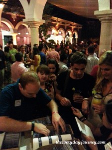 Bloggers getting registered at the Xcaret margarita reception. Are you in this picture?